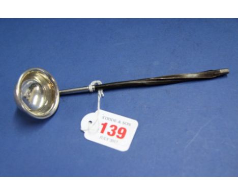 A George III silver toddy ladle with twisted whale bone handle, by E M, 17cm   Condition Report:  Hallmarks are within the bo