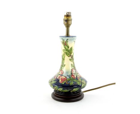 Moorcroft ' Sweet Briar' pattern lamp base, with decoration of a briar rose on yellow to blue ground, 21 cm excluding base an