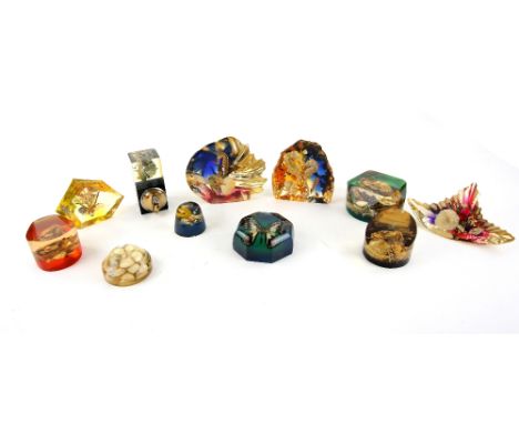  Collection of vintage lucite sea life paperweights, most with shells crabs and sea horses, similar table lighter, and one pa