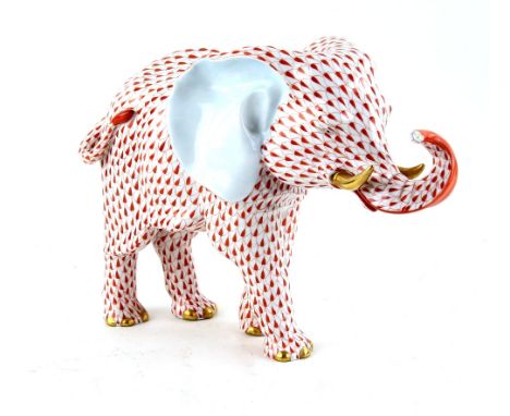 A large contemporary Herend model of an elephant, stood with his trunk elevated and curled, his coat typically decorated in a
