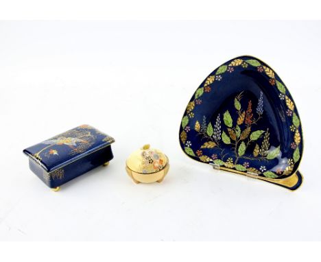 Carlton ware, a trinket box decorated in enamels and gilt with the sketching bird pattern,on a blue lustre ground, 6.5 cm len