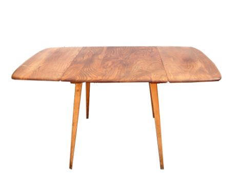 Ercol breakfast table, in elm and beech, with two drop down ends, max size, 137 x 74 cm .    Some staining and rough finish o