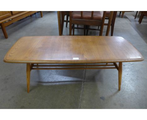 An Ercol Blonde elm and beech Windsor coffee table 