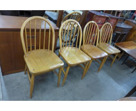 A set of four Ercol elm and beech Windsor chairs 