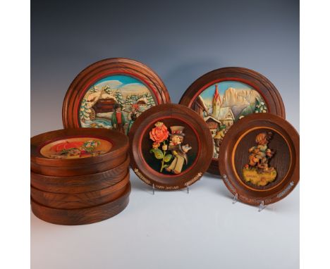 Charming collection of eight vintage ANRI wall plaques, crafted in Italy with intricate wood carvings. Each plaque is uniquel