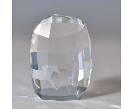 This exquisite Swarovski crystal paperweight, featuring a dynamic depiction of wild horses, was exclusively offered as the SC