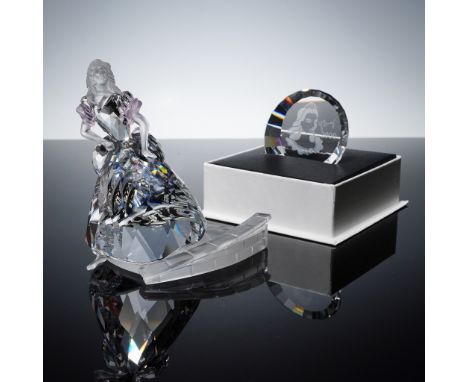 Released in 2000, this Swarovski Crystal Cinderella figurine (item number 255108) is inspired by the classic Disney princess.