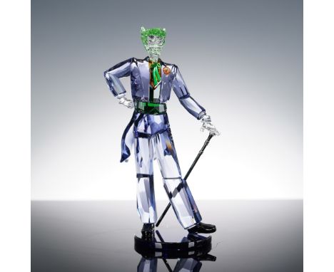 This expressive Swarovski Crystal figurine 5630604 depicts DC Comics' legendary villain The Joker in an artfully faceted desi