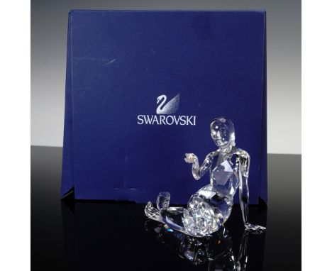 Lead crystal figurine part of the Fables and Tales collection. This posing mermaid is made from clear crystal and she holds a