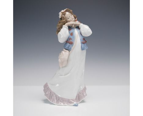 Lovely Lladro porcelain figurine titled Dreams of a Summer Past (Spanish name Suenos de Verano), sculpted by Francisco Polope