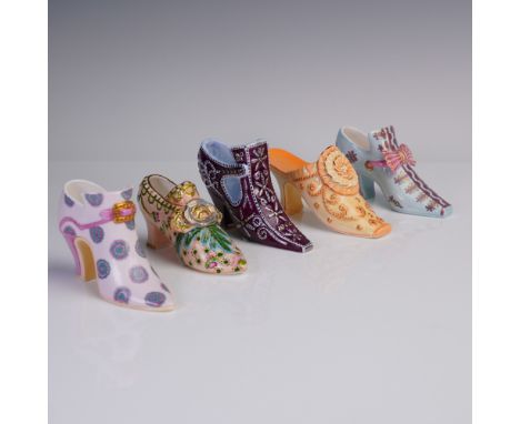 Delightful collection of five porcelain miniature shoe figurines by Halcyon Days, England. Each shoe features a distinct desi