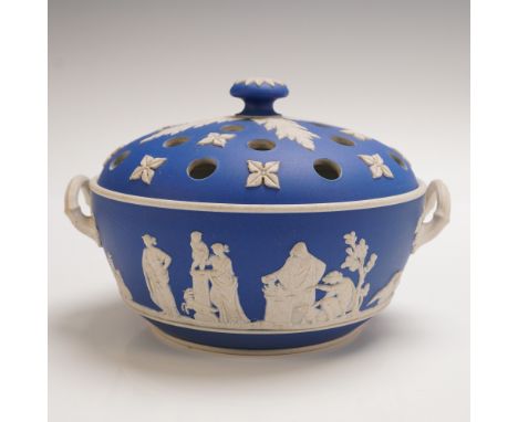 A classic example of English neoclassical design, this Wedgwood jasperware potpourri bowl features a vibrant cobalt blue body