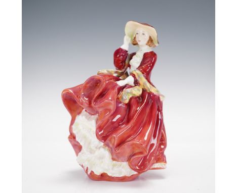Modeled in a beautiful red dress with a colorful scarf. Royal Doulton backstamp. Artist: Leslie HarradineIssued: 1937 - 2004D
