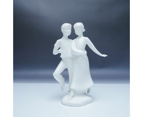 The Royal Doulton Harmony figurine, part of the Images Collection, captures the grace and movement of two children dancing in