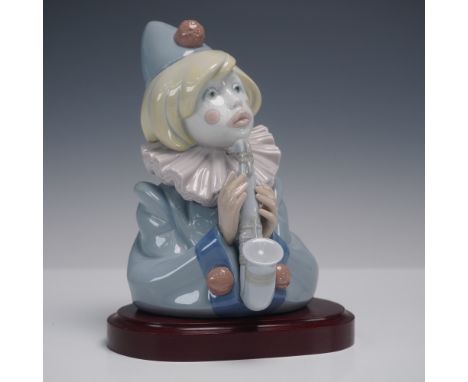 Charming Lladro porcelain figurine titled Sad Note (model 1005586), sculpted by Francisco Catala and issued in 1989. This exp