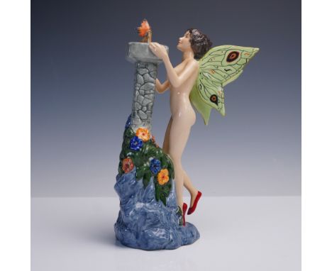 A whimsical porcelain figurine by Carlton Ware, England, depicting a nude fairy with butterfly wings in vivid green, red heel