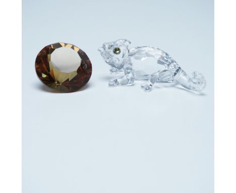 This retired Swarovski crystal chameleon is a striking piece from the 'Rare Encounters' collection, showcasing the brand's ma