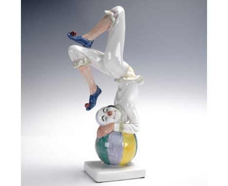 Designed by Douglas V. Tootle and issued in 1989, Tumbling (HN3283) is a lively Royal Doulton figurine portraying a joyful cl
