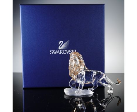 This striking Swarovski crystal figurine captures Mufasa, the noble king from Disney's The Lion King, in majestic detail. Cra