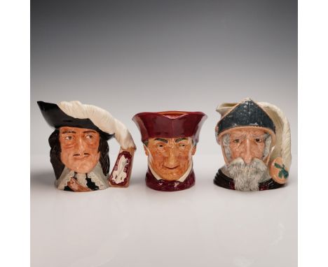 This striking set of Royal Doulton character jugs showcases three iconic literary and historical figures in classic hand-pain