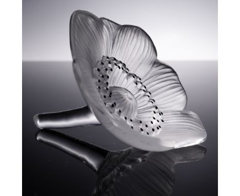 Lalique France crystal sculpture designed in the graceful shape of an anemone flower, featuring a harmonious interplay of cle