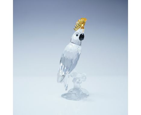 Elegant Swarovski crystal figurine depicting a cockatoo, meticulously crafted with faceted clear crystal, a black beak, and a