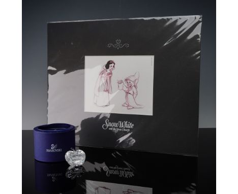 This lot features a delightful Swarovski set inspired by the beloved Disney classic, Snow White and the Seven Dwarfs. Include