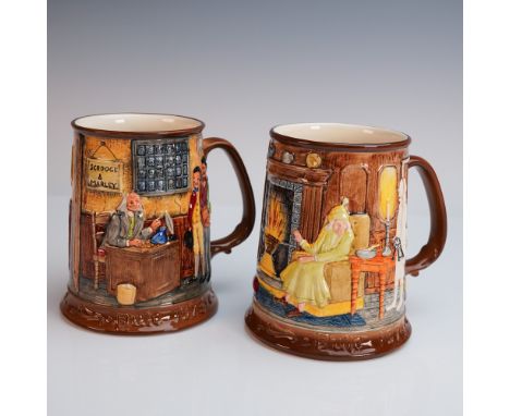 Pair of Royal Doulton Beswick Dickens collectible mugs featuring vivid relief scenes from A Christmas Carol. Each finely deta