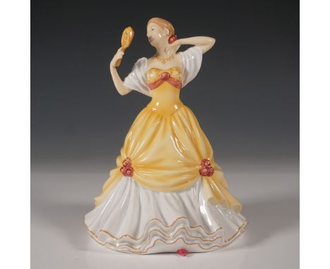 A beautiful Royal Doulton Pretty Ladies "Lauren" figurine, model HN5514, crafted from fine bone china. Designed in England, t