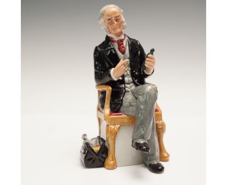 Royal Doulton figurine titled The Doctor, model HN2858, depicting an elderly gentleman seated on an upholstered chair, intent