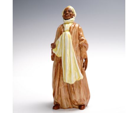 Part of the Middle Eastern Heritage series. Depicts a Middle Eastern man dressed in a thobe. Dark brown dress and yellow scar