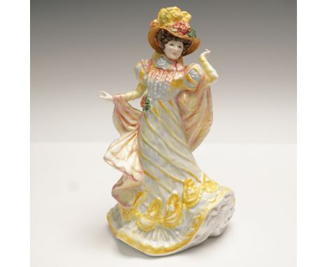 Royal Doulton figurine titled Primrose HN3710 from the Flowers of Love series, hand-decorated and modeled by N. Pedley. Issue