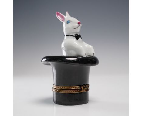 Delightful hand-painted porcelain trinket box modeled as a white rabbit in a magician's top hat. The glossy black hat base is