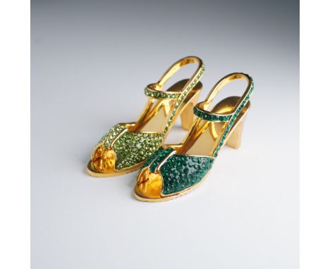 Charming pair of Rucinni jeweled high heel figurines, each crafted in a gleaming gold-tone finish and set with green crystal 