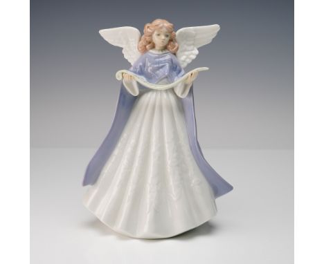 Beautiful Lladro porcelain angel figurine designed as a tree topper. The angel wears a flowing white gown with embossed flora