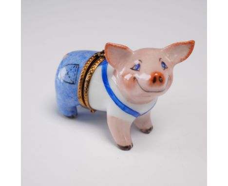 This playful hand-painted Limoges porcelain ring box features a smiling pig dressed in classic blue overalls and a white shir