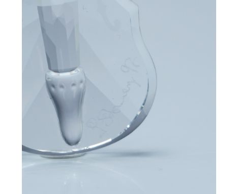 Elegant Swarovski crystal figurines featuring a finely crafted harp and violin, both meticulously faceted to capture and refl