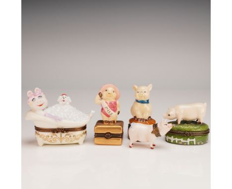 Charming set of five hand-painted porcelain pig-themed treasure boxes, each with hinged lids and whimsical character designs,