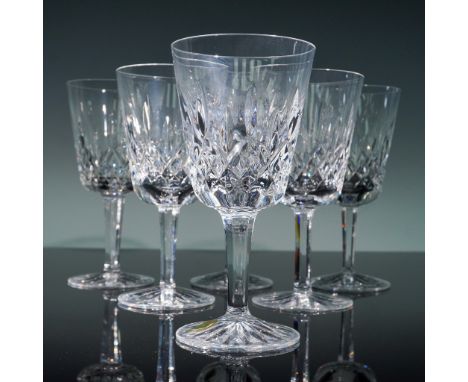 Offered is a set of six stunning crystal wine glasses by Waterford, showcasing the renowned Lismore pattern with deep diamond