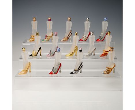 A glamorous set of 14 vintage-style jeweled high heel glass scent bottles, each intricately styled to resemble a woman's leg 