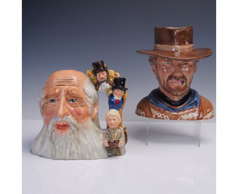 This lot features two limited edition character jugs crafted by Bairstow Manor Pottery. The first depicts Clint Eastwood as t