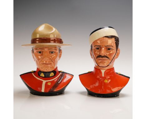 This limited edition Royal Doulton set features two hand painted character jugs commemorating the Centennial of the Royal Can