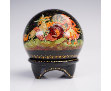 This vibrant Russian lacquer miniature box is crafted in a distinctive domed sphere form, set on a matching fitted pedestal b