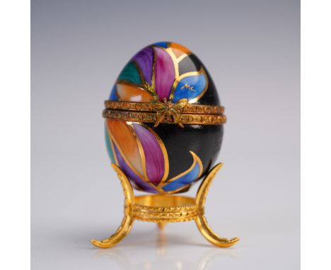 Finely hand-painted Limoges porcelain egg-shaped trinket box featuring bold Art Deco-style petal motifs in vibrant shades of 