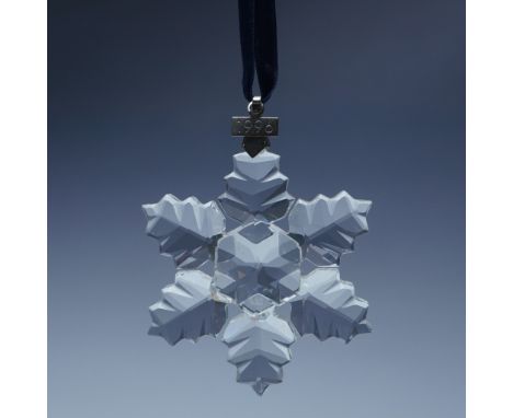 Swarovski crystal holiday ornament from 1996, featuring a beautifully cut six-pointed snowflake design with intricate faceted