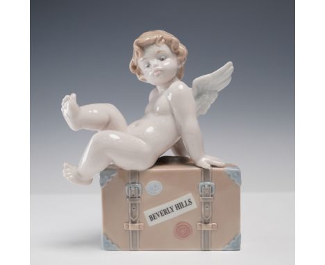 Lladro porcelain figurine titled Travel the World (Beverly Hills), model number 1007311, designed by Antonio Ramos and issued