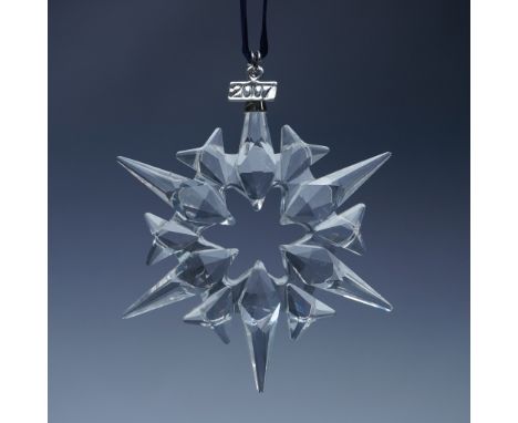 An addition to Swarovski's annual Christmas ornament series, this 2007 edition features an intricate twelve-point snowflake d