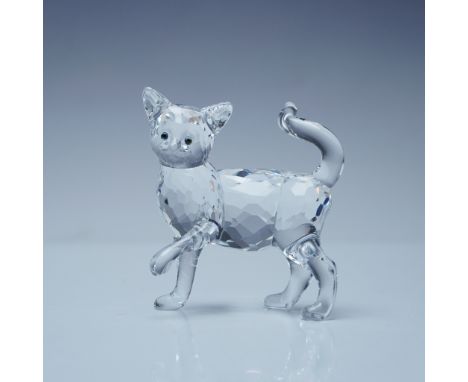 This elegant Swarovski crystal figurine captures the grace and beauty of a mother cat. Crafted from clear faceted crystal, th
