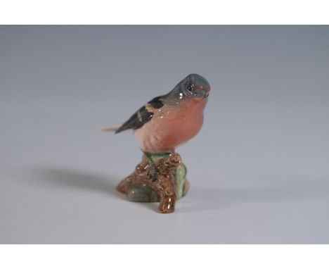 A finely crafted Beswick by Royal Doulton porcelain figurine of a Chaffinch, model 991. This detailed bird figurine features 