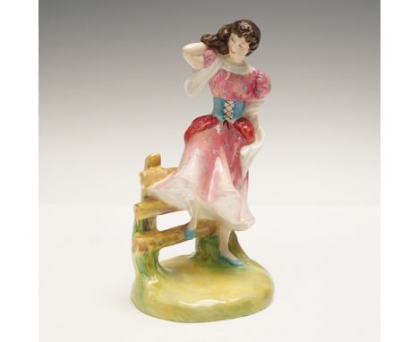 Part of The Seasons Collection. Glazed, hand painted figurine sitting on a fence, a breeze through her dress and hair. Royal 